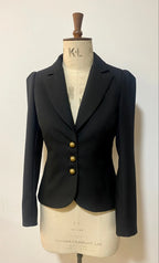 A tailored Missy DuPont jacket displayed on a mannequin, featuring a cutaway rever collar and tuck shoulder detail.